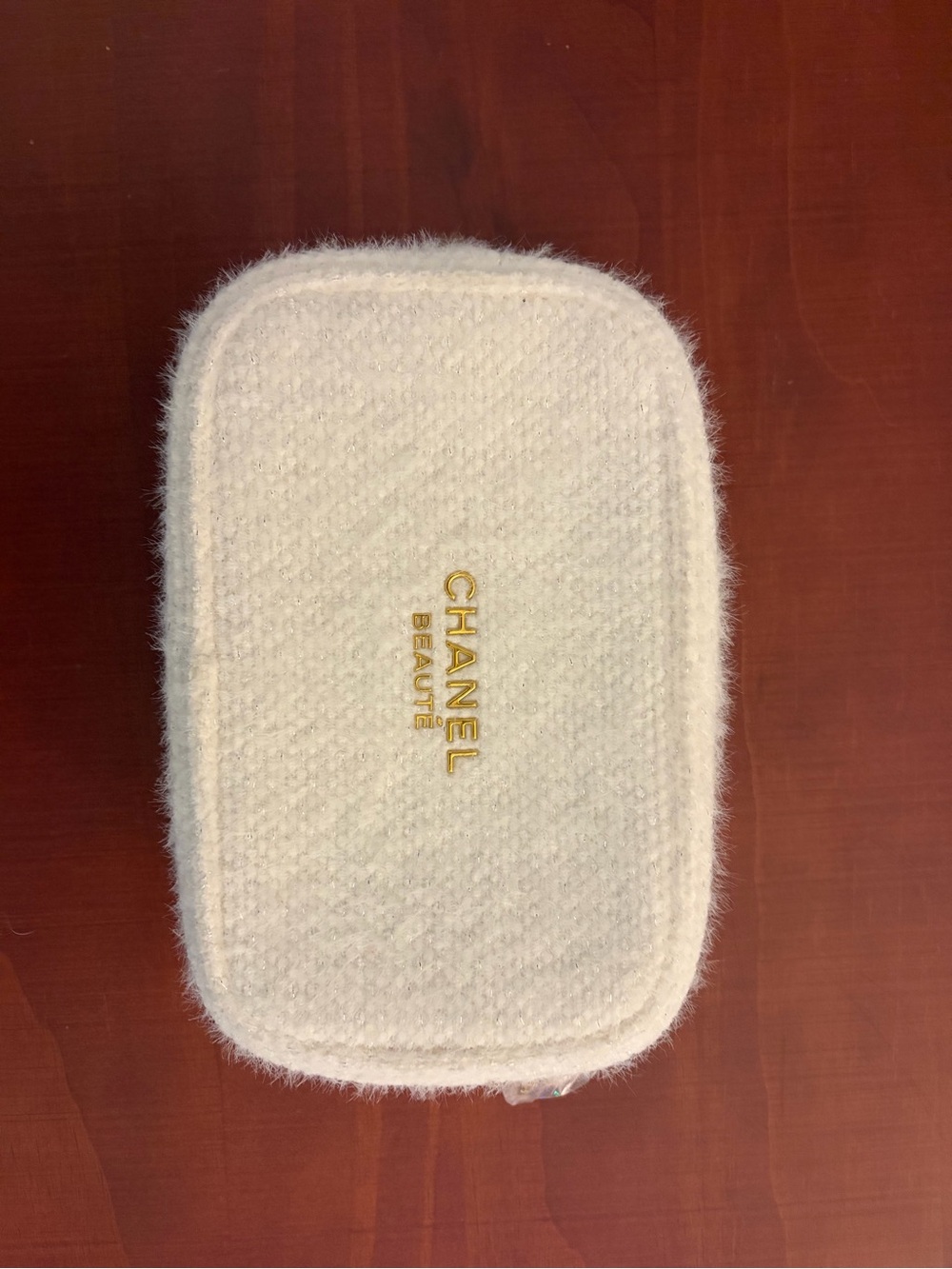 BRAND NEW CHANEL Cream Plush Travel Pouch with Gold Logo